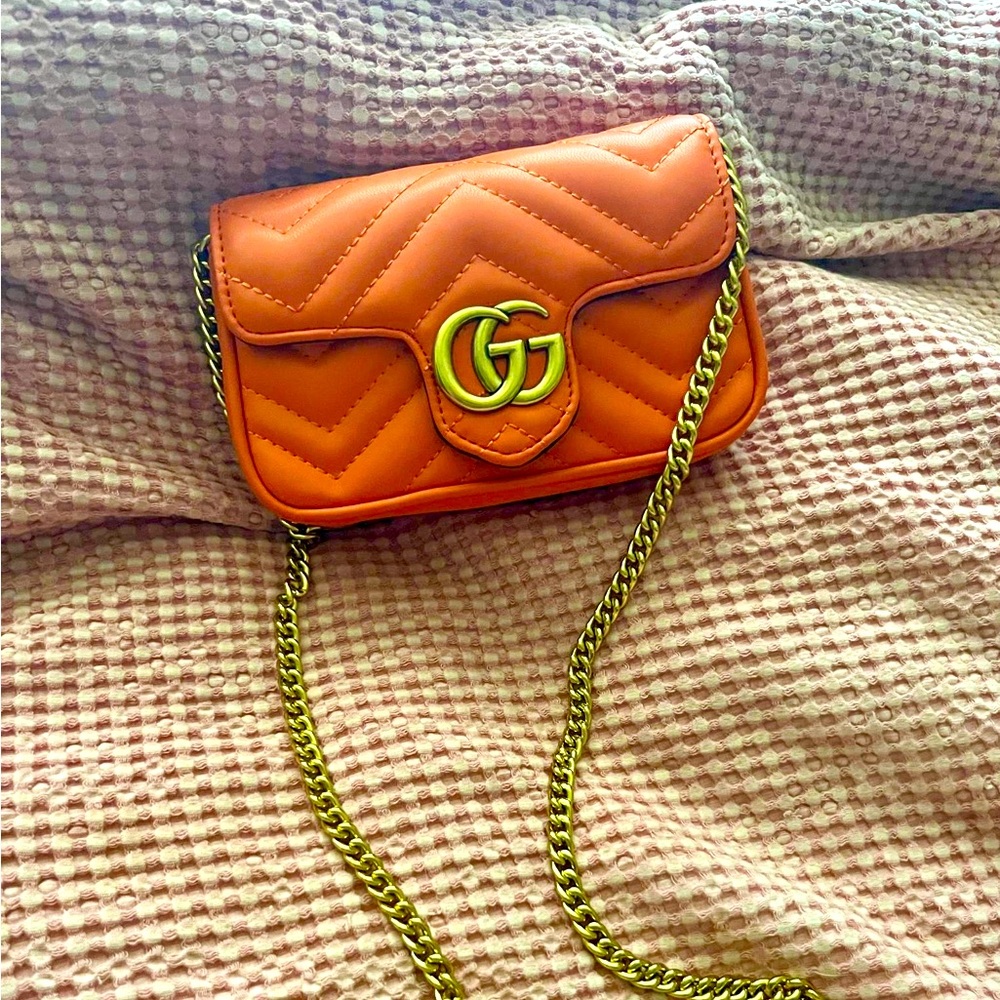 Elegant Orange Quilted Crossbody Bag with Chain